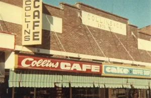 oldfashioned colour photo of a row of shops in Nambour. Signs saying 'Collins Cafe' and 'cake'.